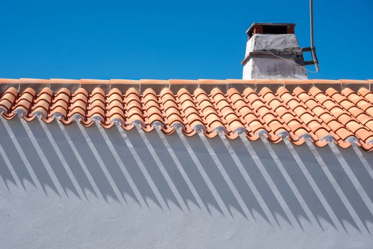 Roof ridge line and chimney on a home in Temecula, CA
